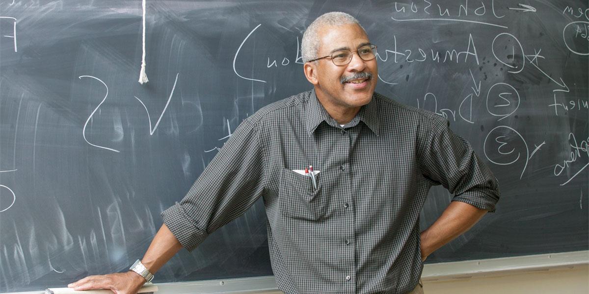 Lester Brooks teaching a history class